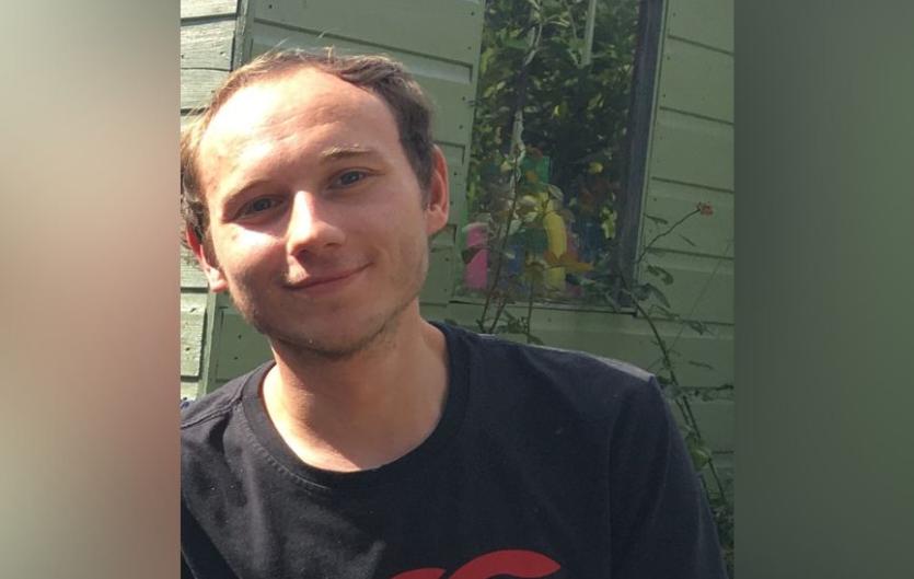 A man looking at the camera and smiling A man looking at the camera and smiling