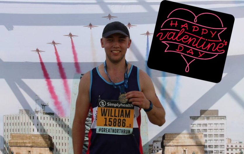 Will Torr at a running event, displaying his medal