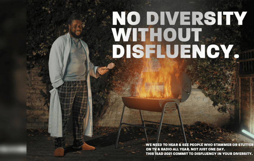 No Diversity Without Disfluency concludes A man next to a barbecue, looking at the camera, with the text 'No Diversity Without Disfluency' above him