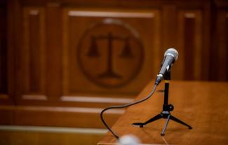 A microphone in a courtroom setting