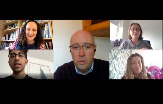 Five people taking part in a video call, with two men and three women