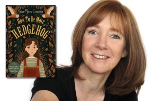 A woman smiling, with an inset of an illustrated children's book cover