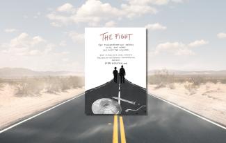 A book cover with a road behind it