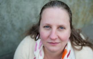 A woman looking at the camera