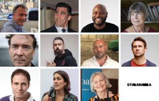 Heads and shoulders of eleven people, eight men and three women