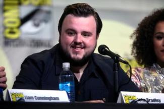 A man speaking at a press conference