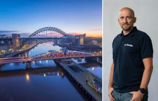 The bridge over the River Tyne at sunset, next to a man smiling