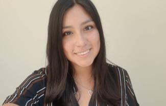 A woman smiling