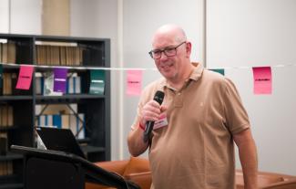 A man speaking into a microphone