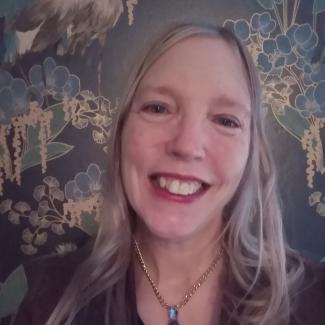 A woman smiling