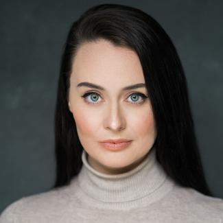 A woman smiling