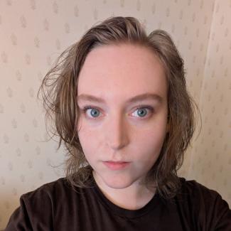 A woman looking at the camera
