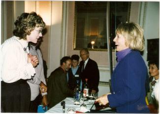 The celebrity Esther Rantzen standing on the right, chatting with a woman standing on the left