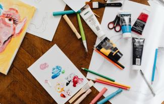 Arts and craft materials, including paper, paint, pencils, scissors and paintbrushes