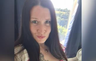 A woman smiling