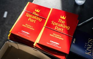 Two piles of a printed brochure, with 'The SpeaKing Part' as the title
