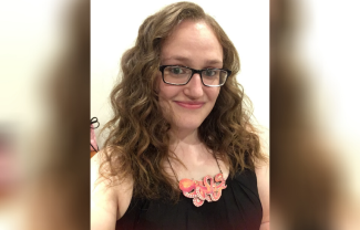 A woman smiling