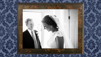 A framed picture showing a bride and her stepfather at a wedding
