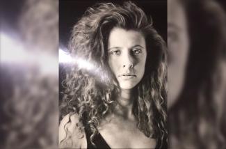 A woman looking at the camera