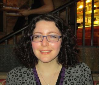 A young woman smiling for the camera