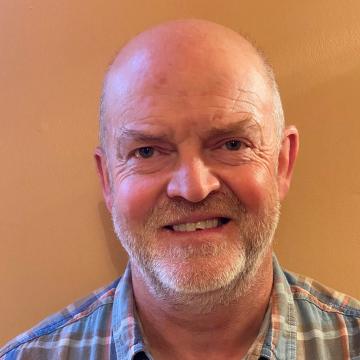 A  close up of a man smiling