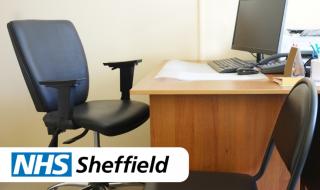 An empty doctor's consultancy room, with a question mark on one of the chairs and the words 'NHS Sheffield'