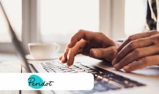 A person's hands typing on a laptop computer. There is an inset of a logo saying the word 'Peridot'