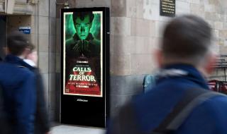 Photo of our Calls Of Terror movie poster on a JCDecaux street wall digital screen
