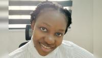 A woman smiling