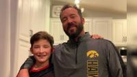 what to do when speech therapy isn't working A man standing with his arm round his son