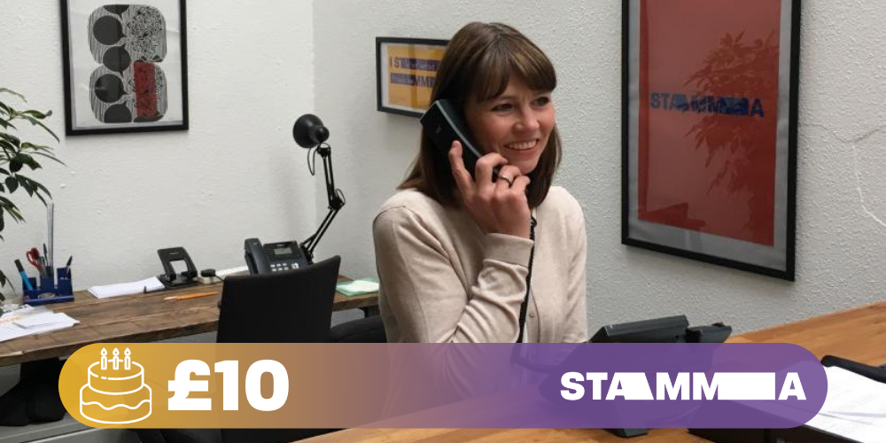 A woman speaking on the telephone