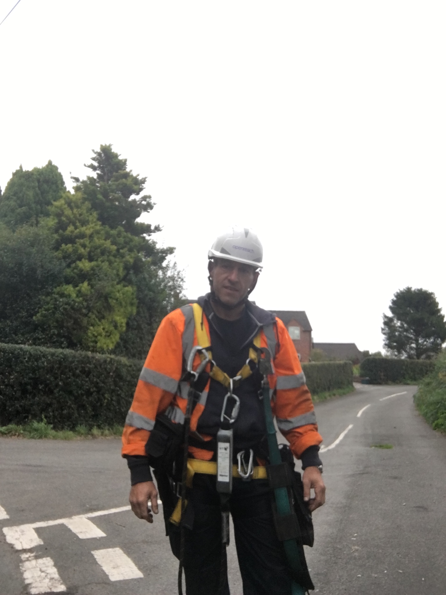 Ian in his uniform as a broadband engineer