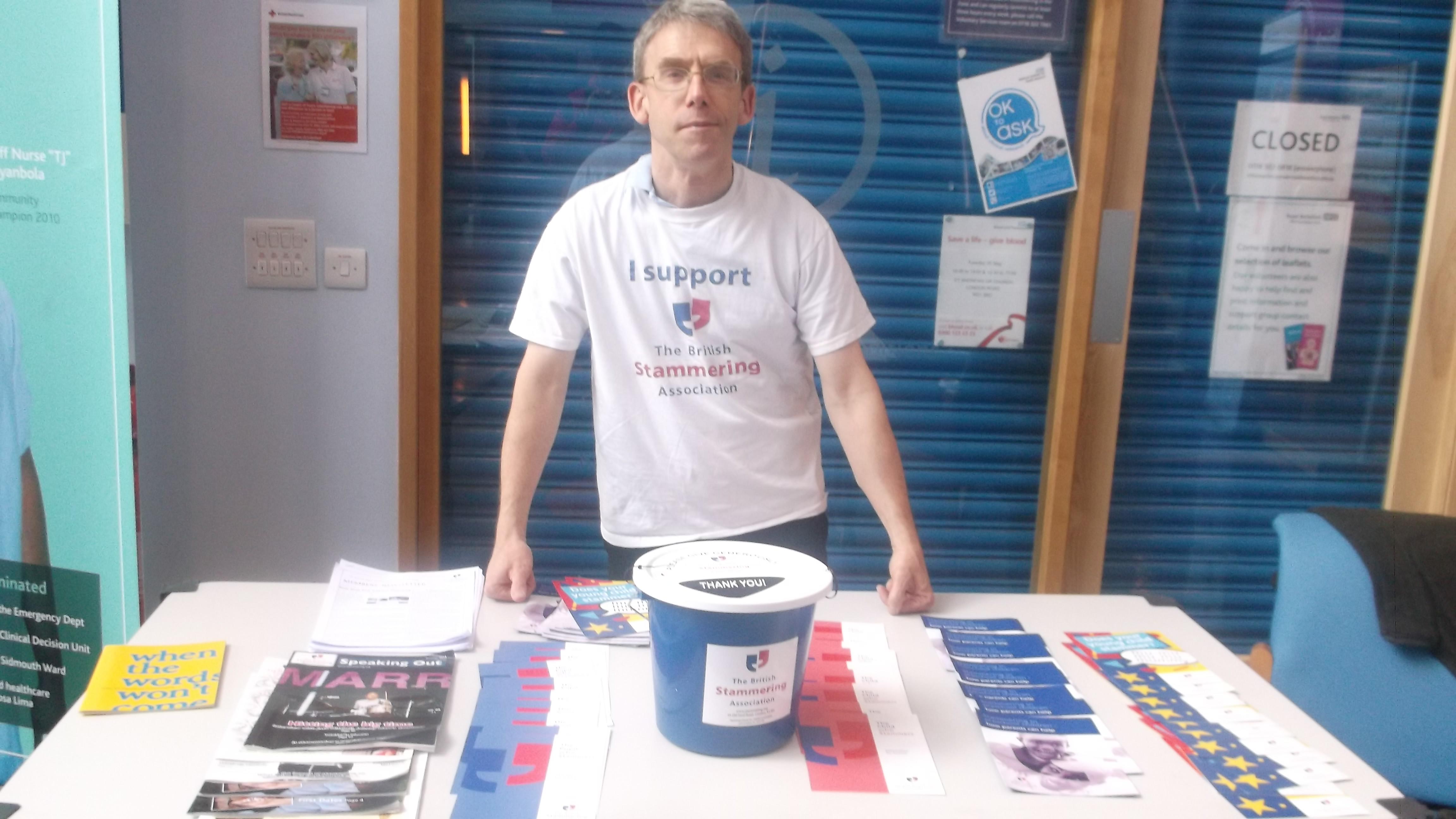John Russell at an information stand